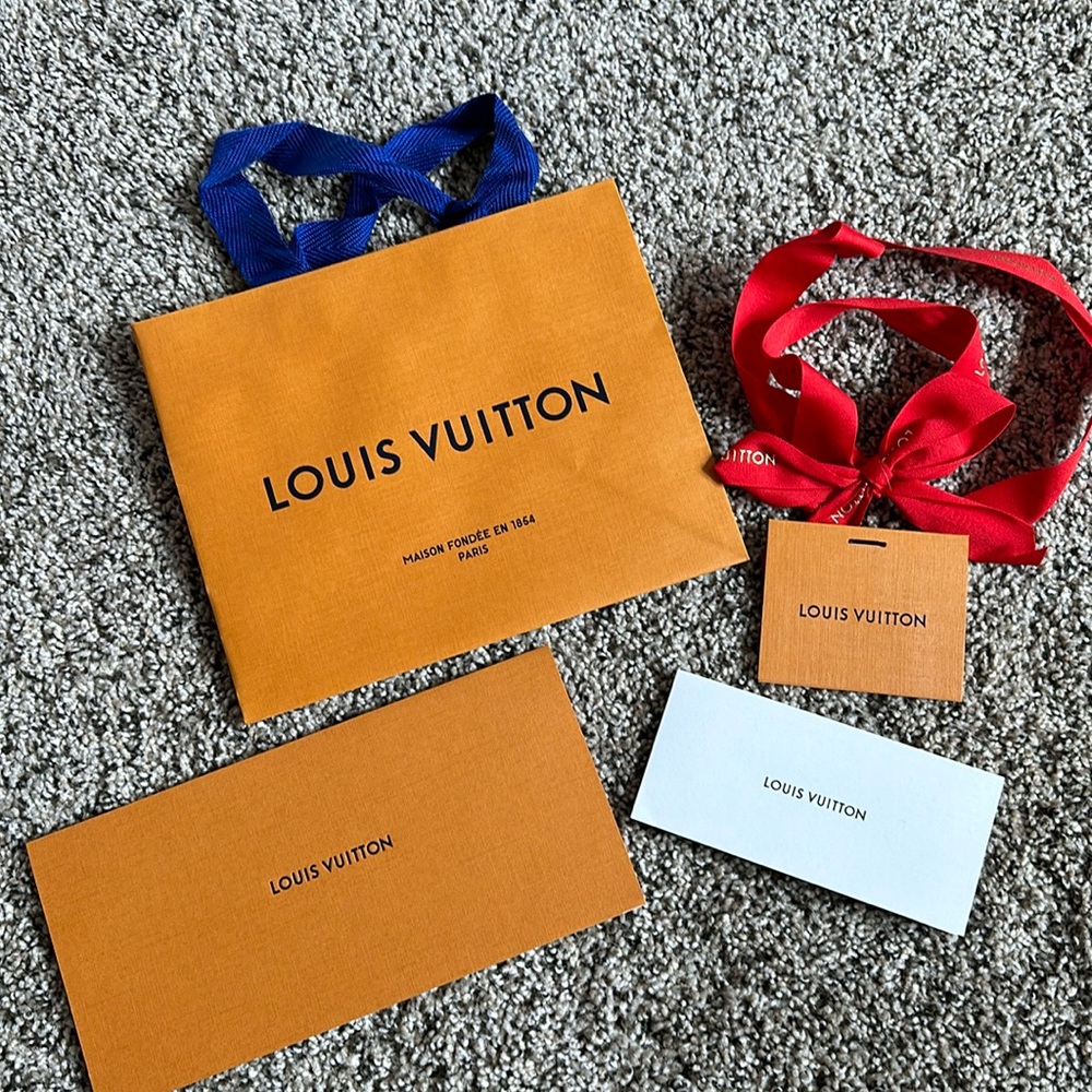 Louis Vuitton small bag, ribbon, receipt envelope, regulation card & small env.